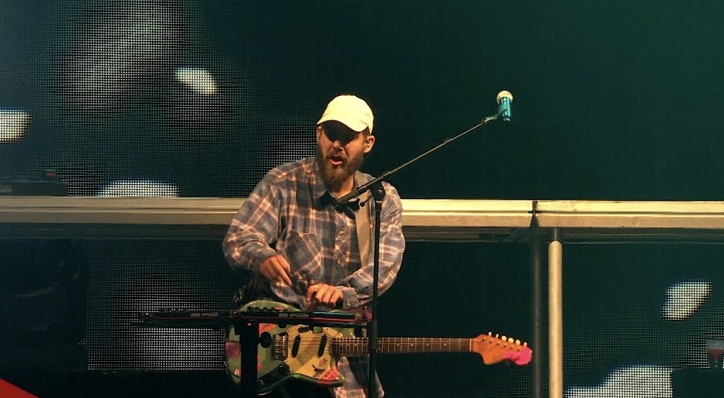 San Holo on stage with guitar